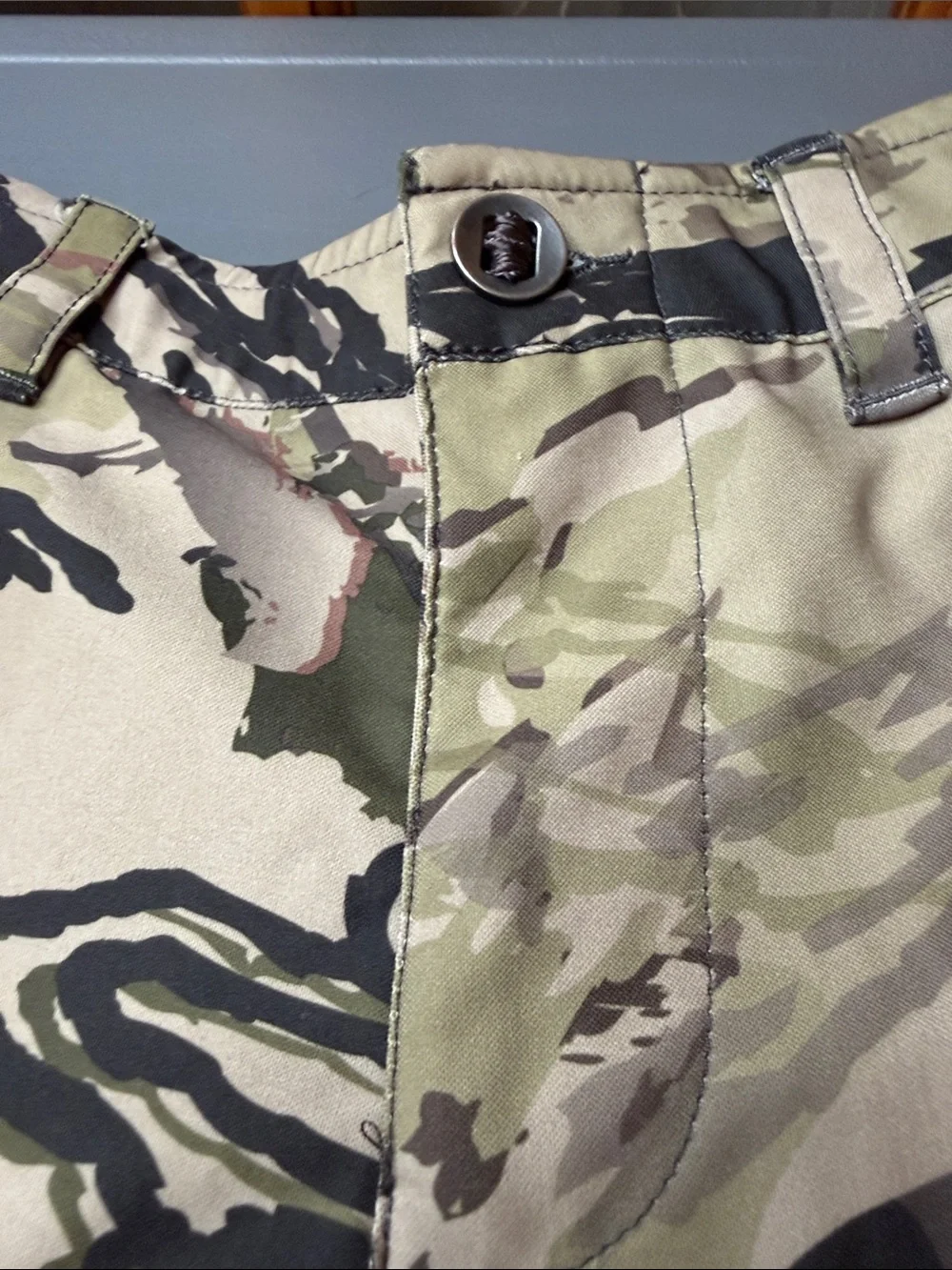 Kid’s Under Armour Storm Camo pants. Size: 10
